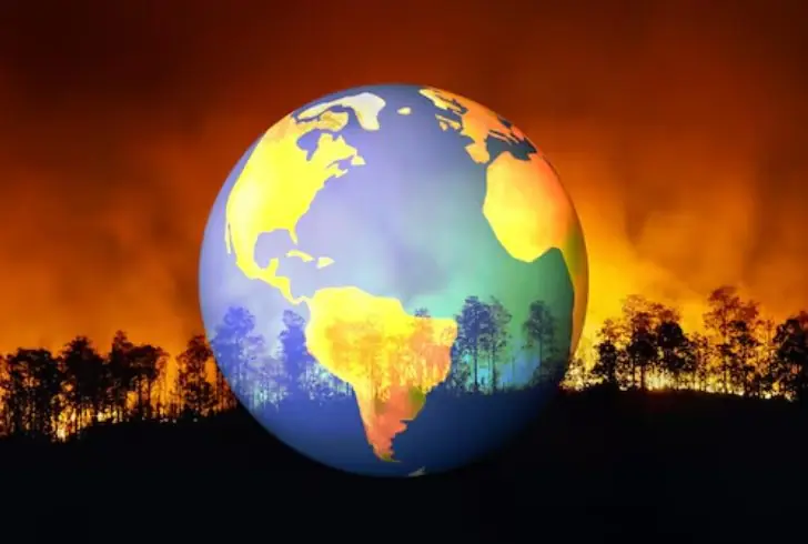 Glowing Earth with wildfire backdrop
