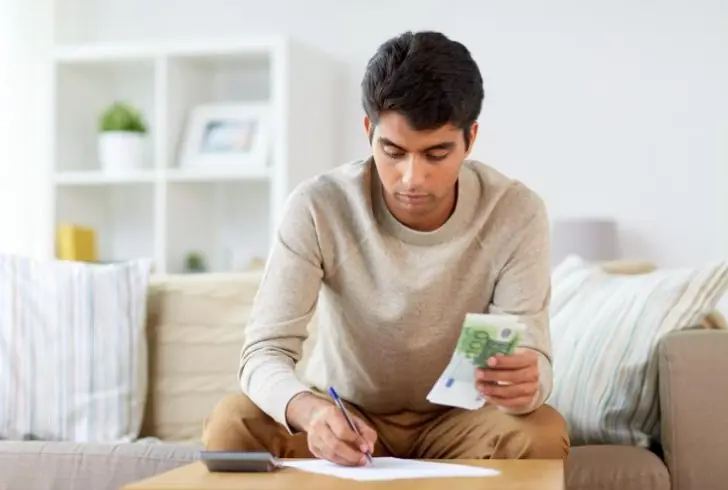 Person reviewing their finance